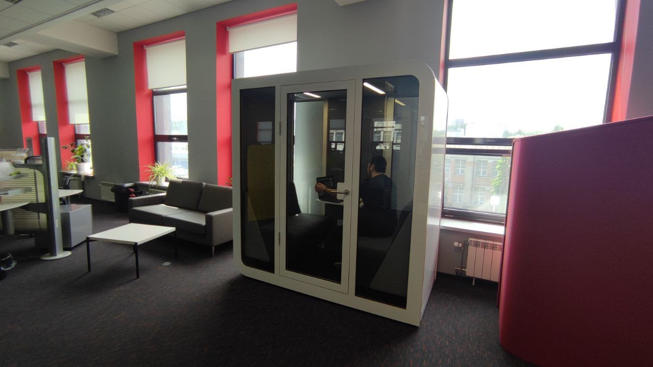 A Silentbox booth in a coworking lounge